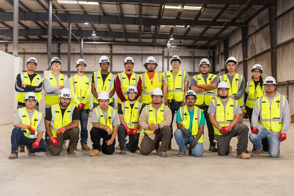 Team of Construction Workers in Warehouse